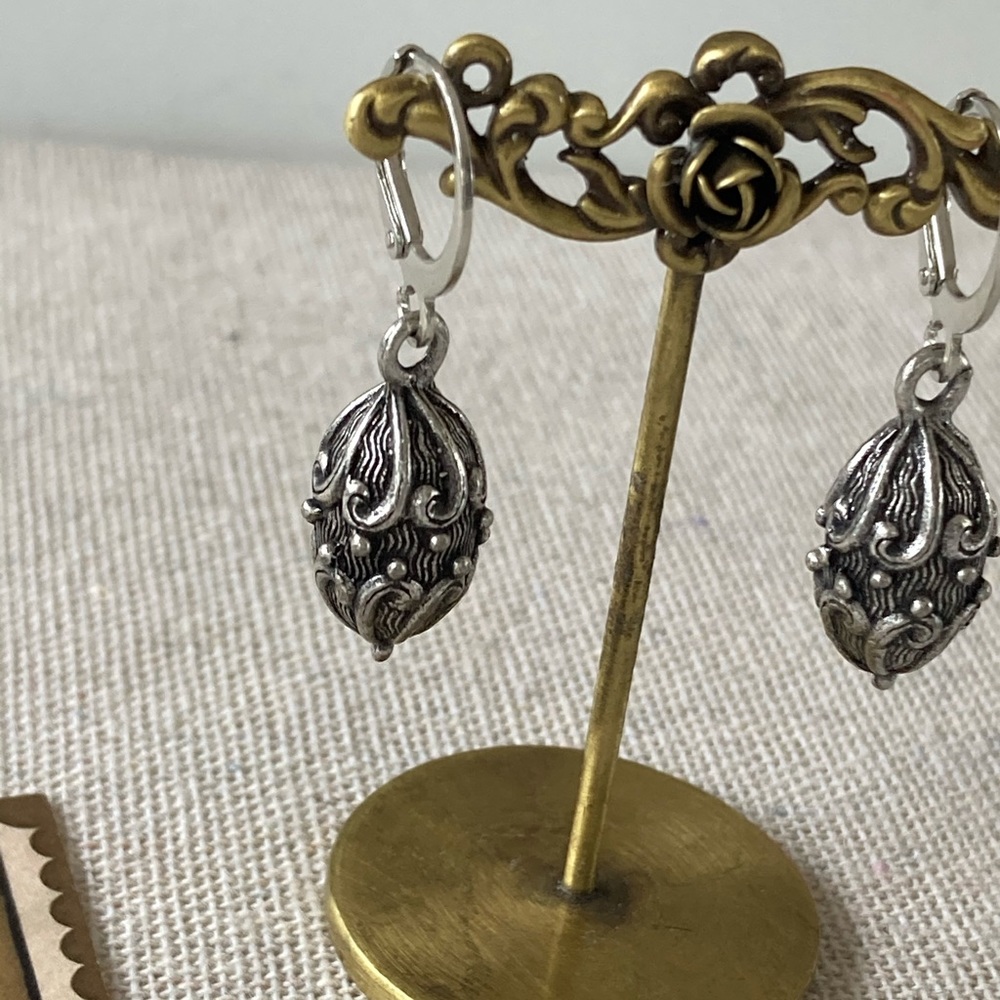 Silver Metal Oval Carved Bead Earrings - Picture 3 of 3